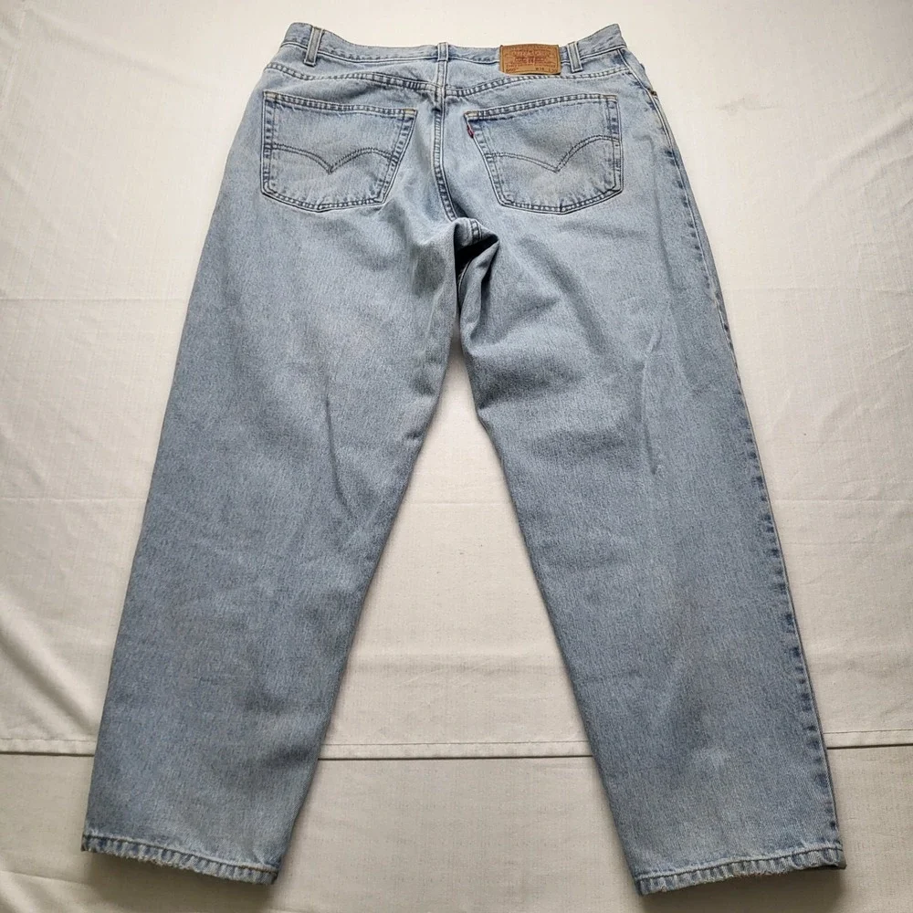 VTG Levis Jeans 560 Mens 36/30 Loose Fit Tapered Blue Light Wash 90s Y2K Baggy